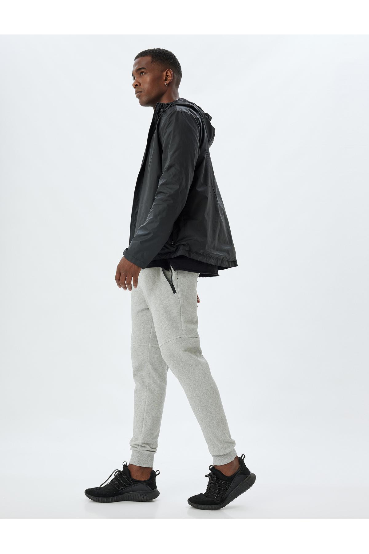 شلوار ورزشی اسپرت دوخت توری دور کمر ترکیبی پنبه ای با جزئیات